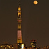 夜の清洲橋に輝くスカイツリーと月齢12.8の月