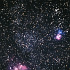 夏の夜空に輝く三裂星雲と干潟星雲