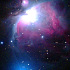 大きなオリオン大星雲と小さな人工衛星